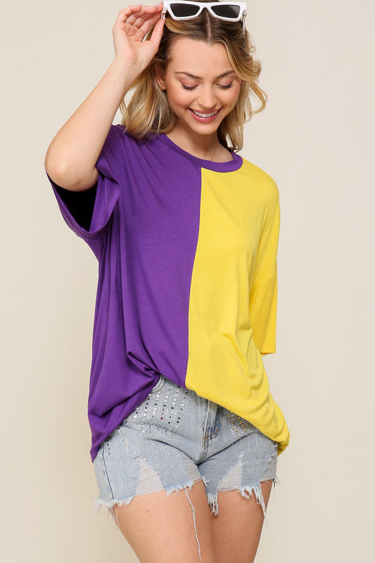 A versatile woman's Timing comfort t-shirt, the Color Block Scoop Neck Knit Top, in a color block design with a scoop neck.