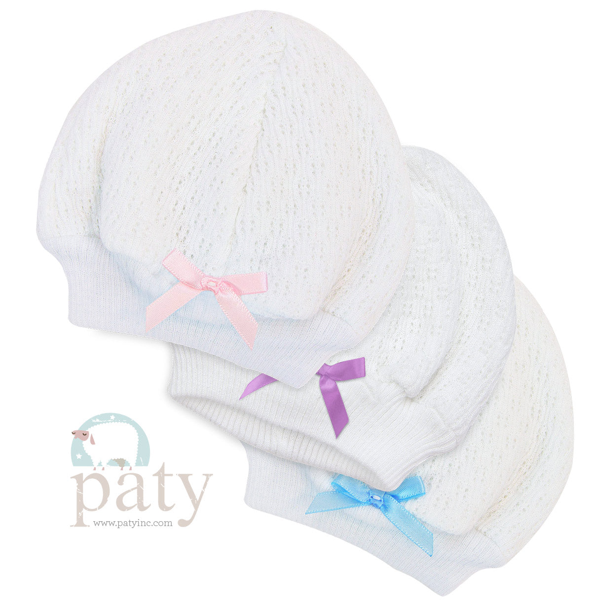 Three white Paty Beanie hats with bows on them.