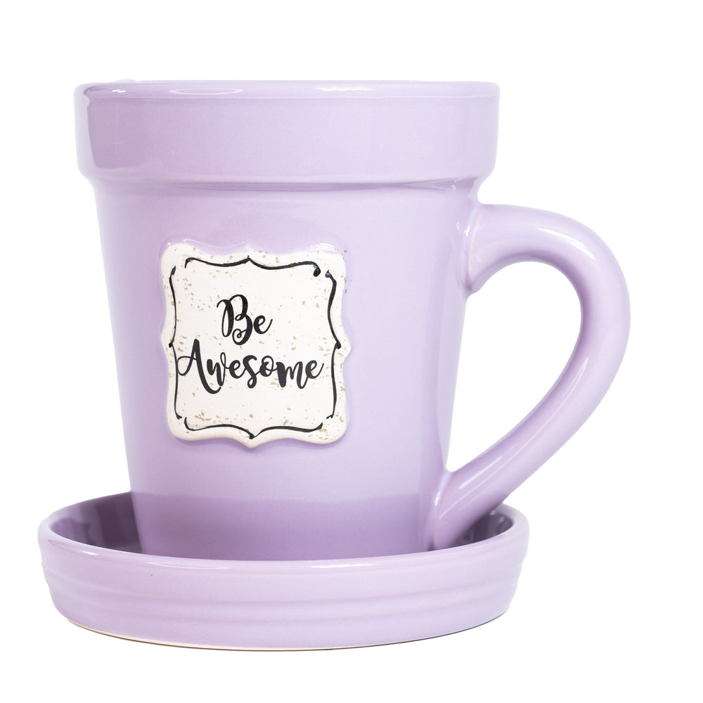 A Lilac Flower Pot Mug - Be Awesome with a saucer on a white background from Nicole Brayden.