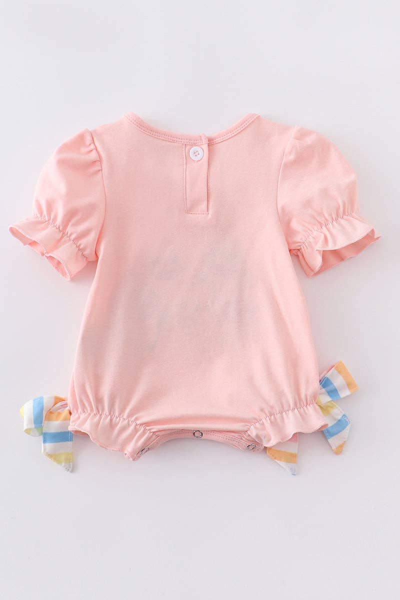A baby girl's Honeydew Pink Shark Embroidery Girl Bubble with ruffled sleeves.