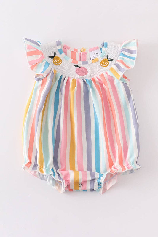 A Honeydew multicolored stripe orange peach smocked baby romper with a cat on the chest.