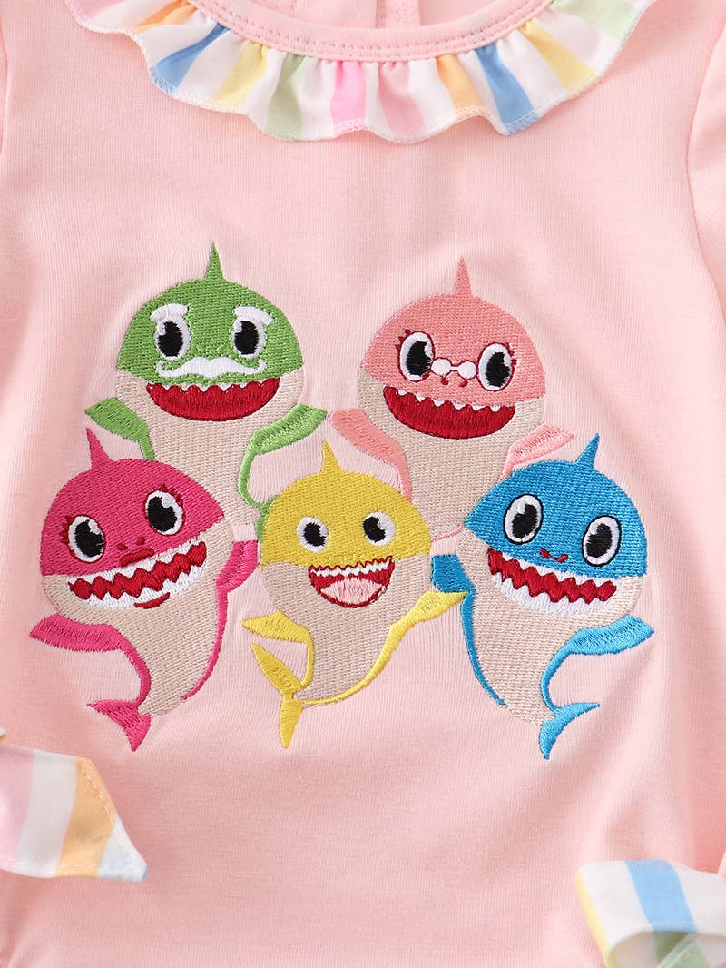 A Honeydew Pink Shark Embroidery Girl Bubble shirt with a picture of a group of sharks on it.