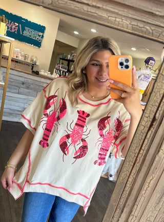 Woman showcasing Black and Gold Game Day Tee 