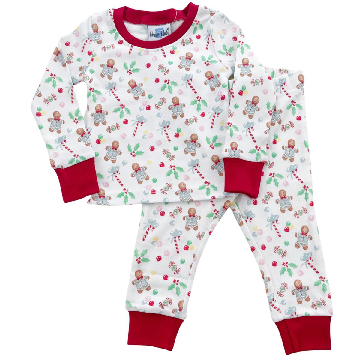 A baby's Boy Gingerbread Pajama Pant Set with a red and white pattern by Chickie Collective.