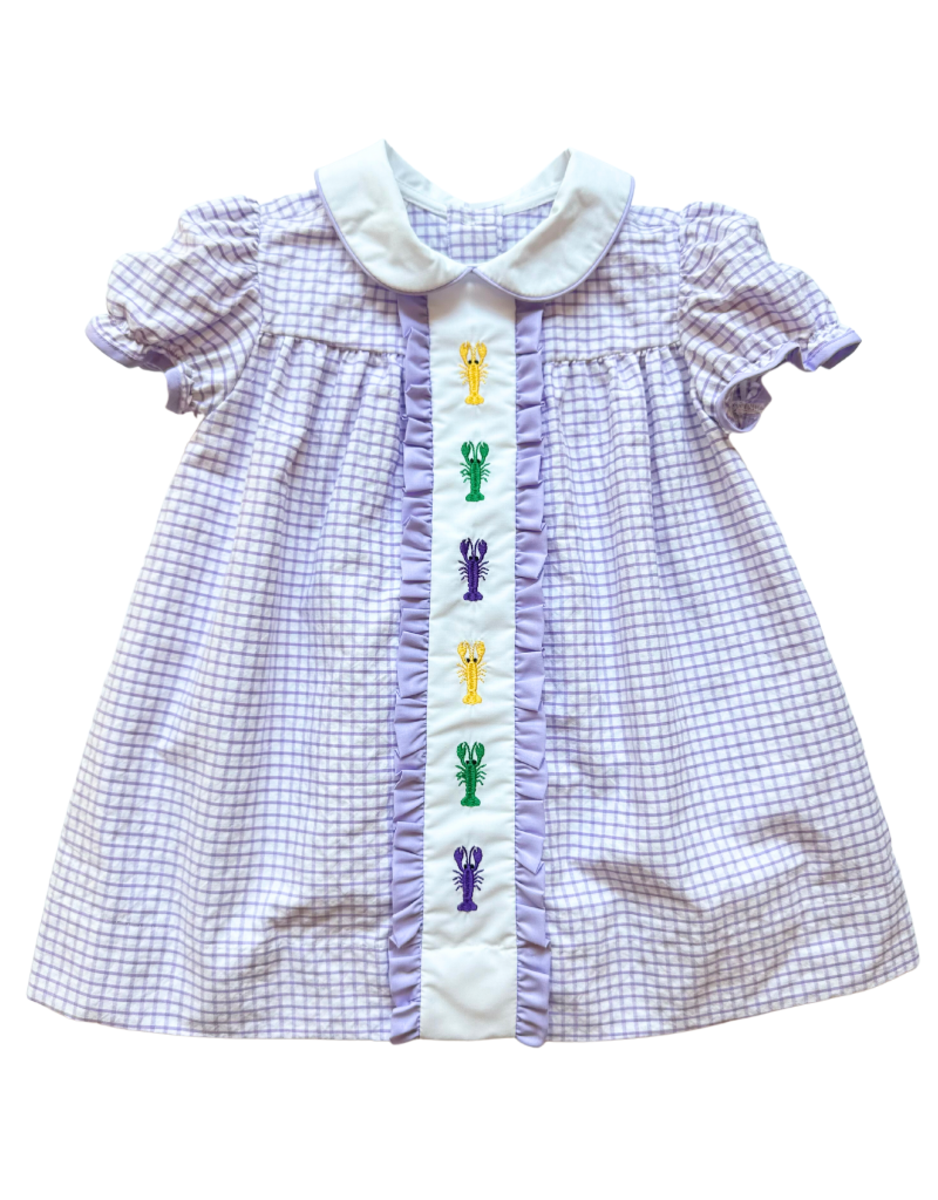 A baby girl's Crawfish Mardi Gras Dress, perfect for Mardi Gras festivities, adorned with embroidered rhinestones designed by crew.
