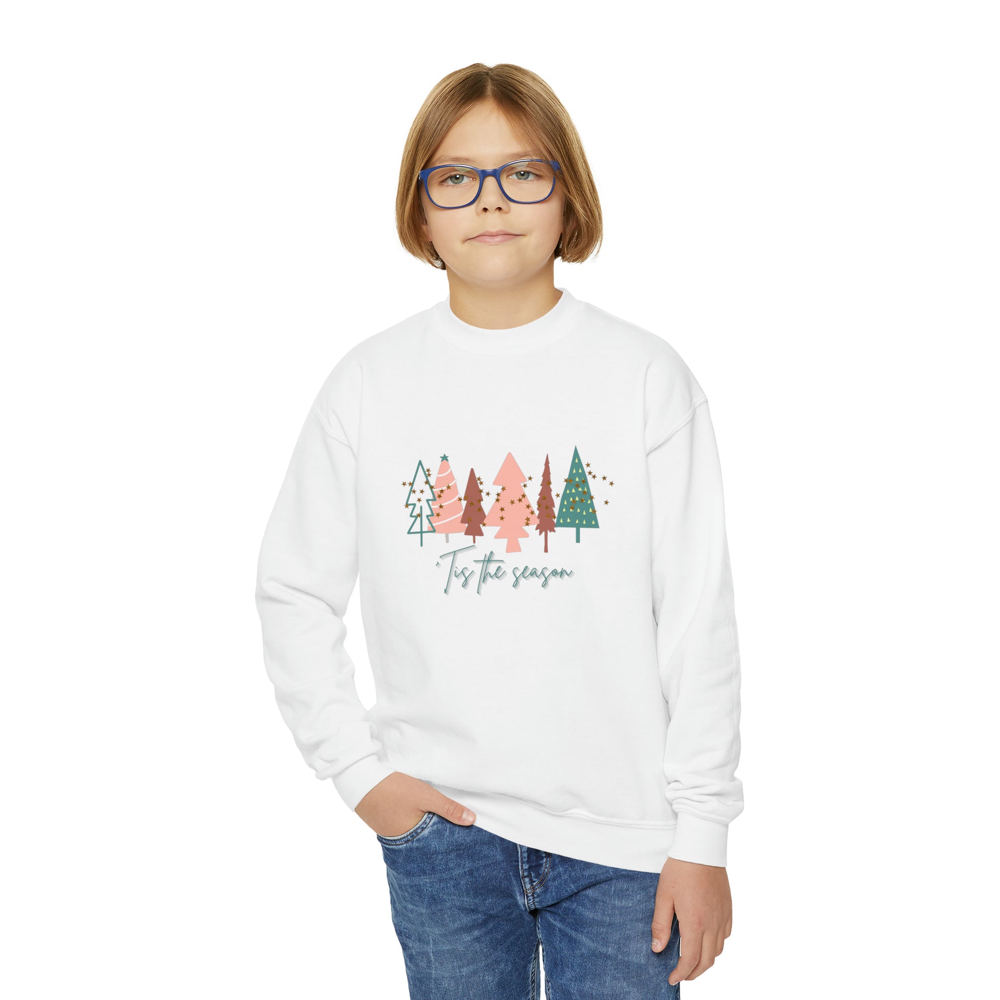 A young girl wearing a cozy white Gildan Youth Sweatshirt with trees on it, made by Printify.