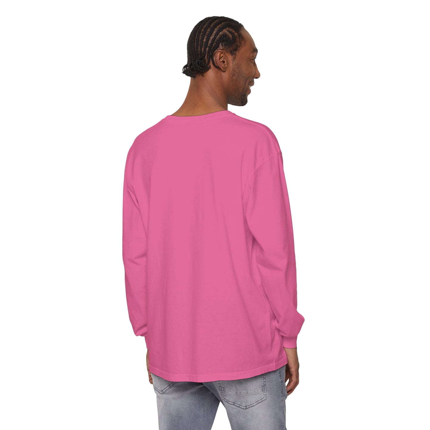 A man wearing a cozy pink Printify HO HO HO Santa Outline Pink Long Sleeve Tee - Cozy Comfort Colors Unisex Shirt - Crewneck Holiday tee.