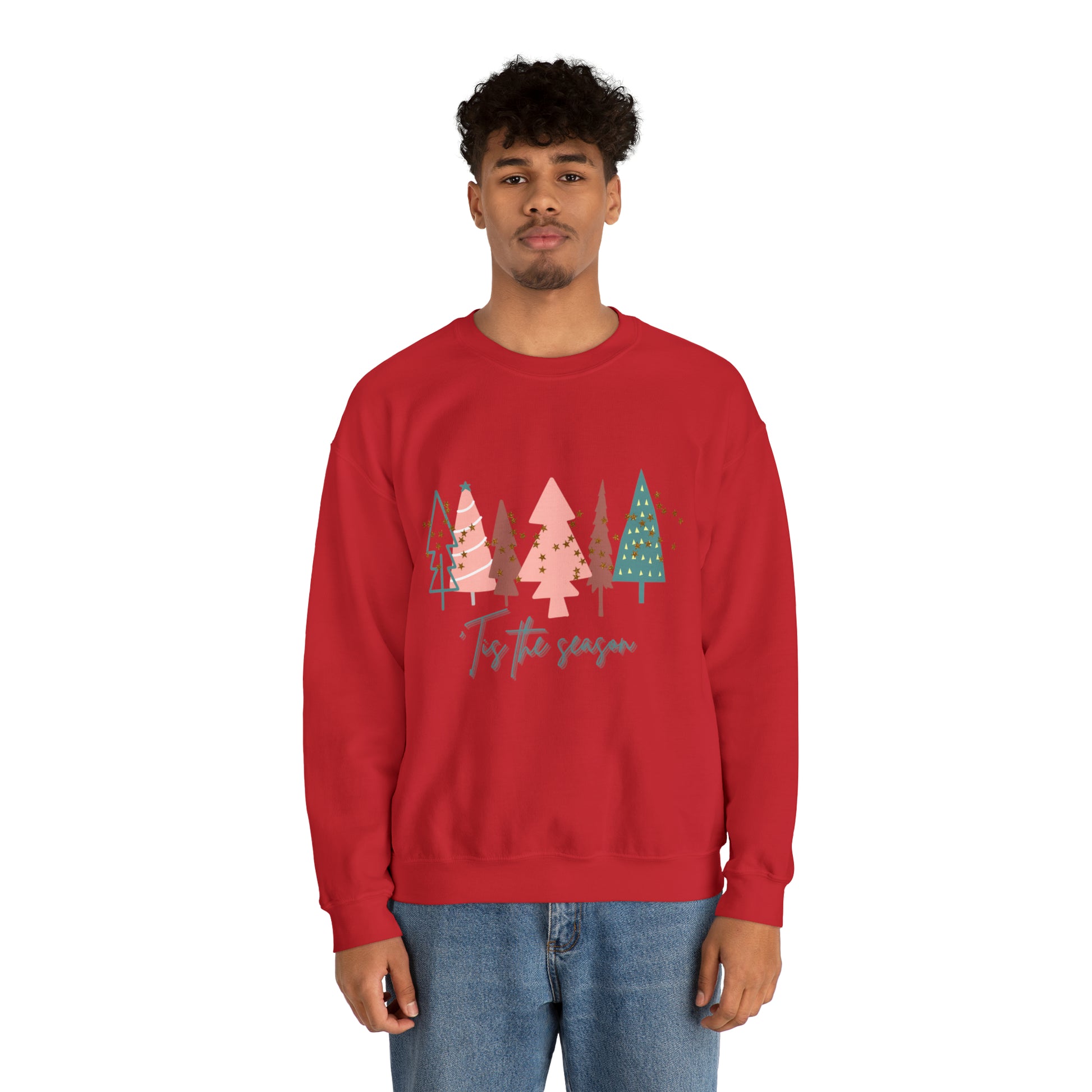 A cozy man wearing a red Printify Christmas Tree Sweatshirt.