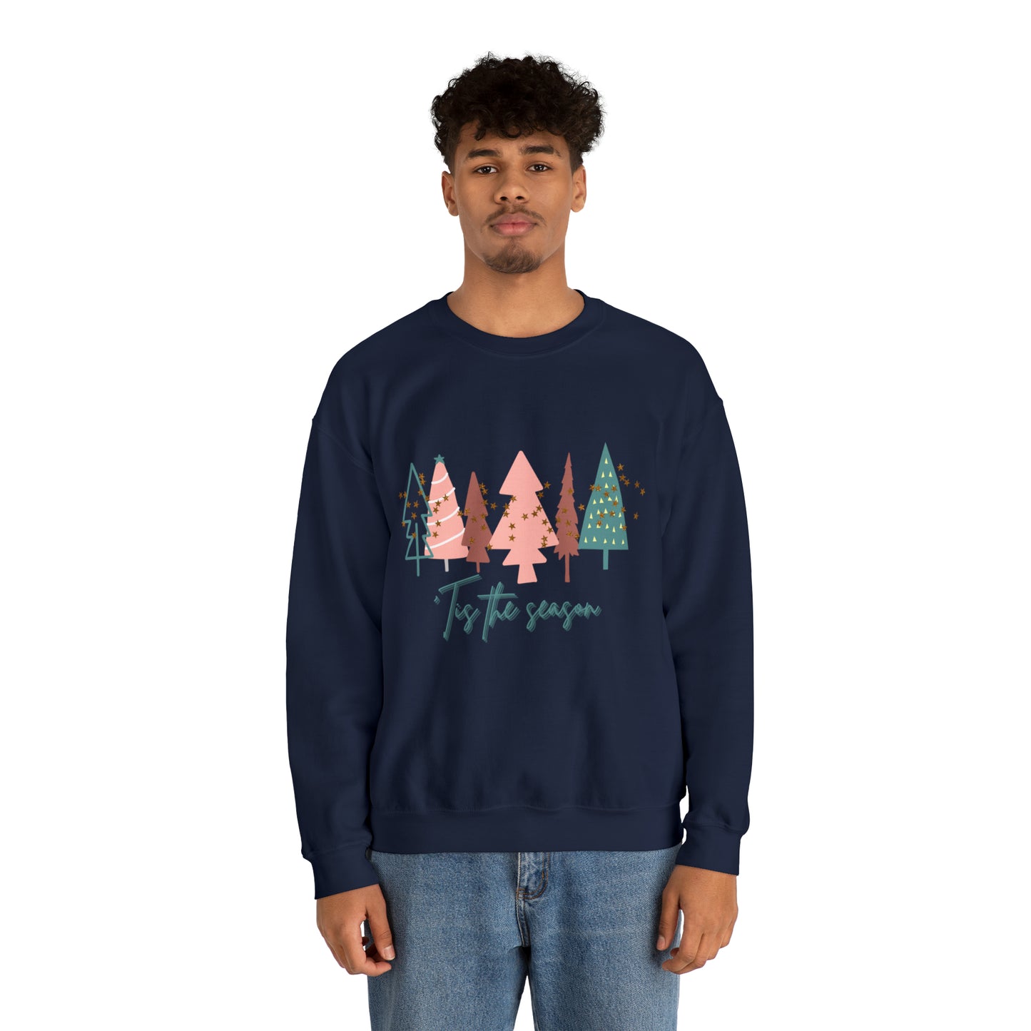 A man wearing a Christmas Tree Sweatshirt from Printify in his holiday wardrobe.