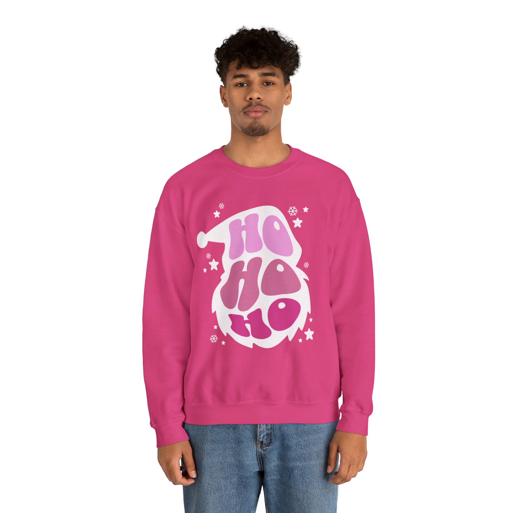 A man wearing a stylish Ho Ho Ho Santa Outline Pink Holiday Sweatshirt from Printify, exuding both comfort and style.