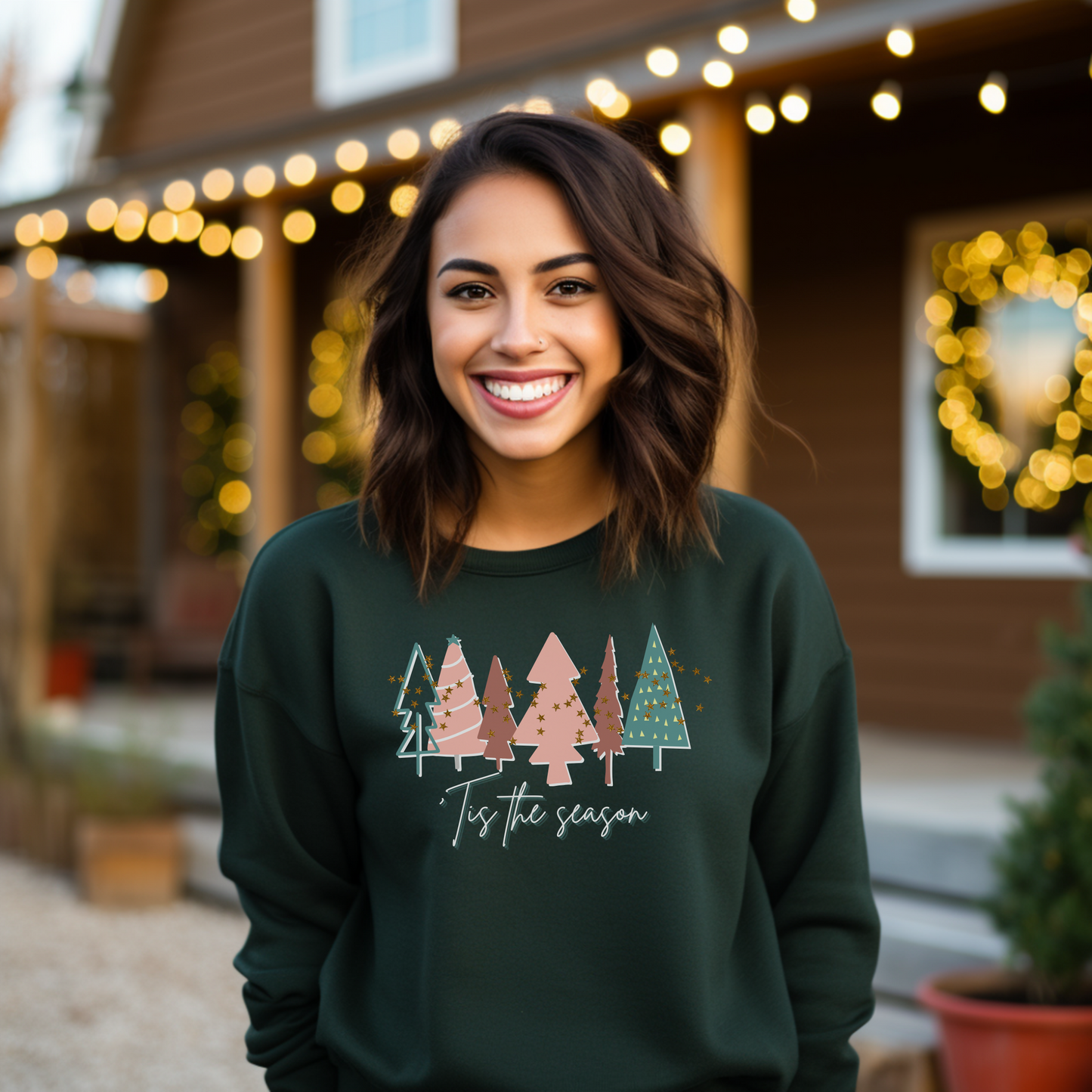 A woman wearing a cozy Forest Green Christmas Tree Sweatshirt from Printify.