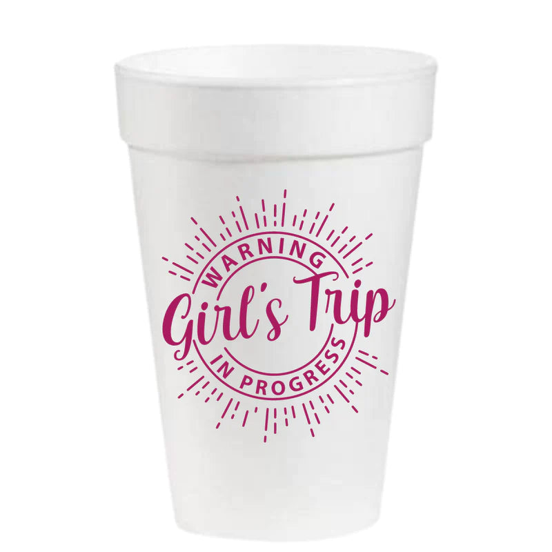 A durable white Pink Machine Styrofoam party cup with the words 'girl's trip' on it.