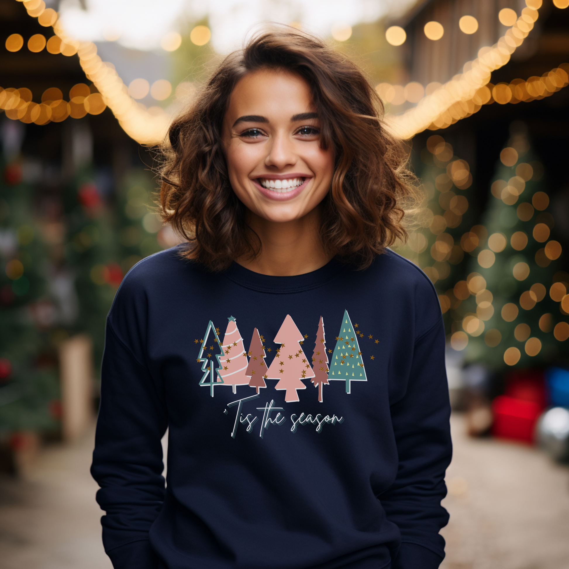 A cozy woman in a Navy Christmas Tree Sweatshirt from Printify, perfect for the holiday wardrobe.