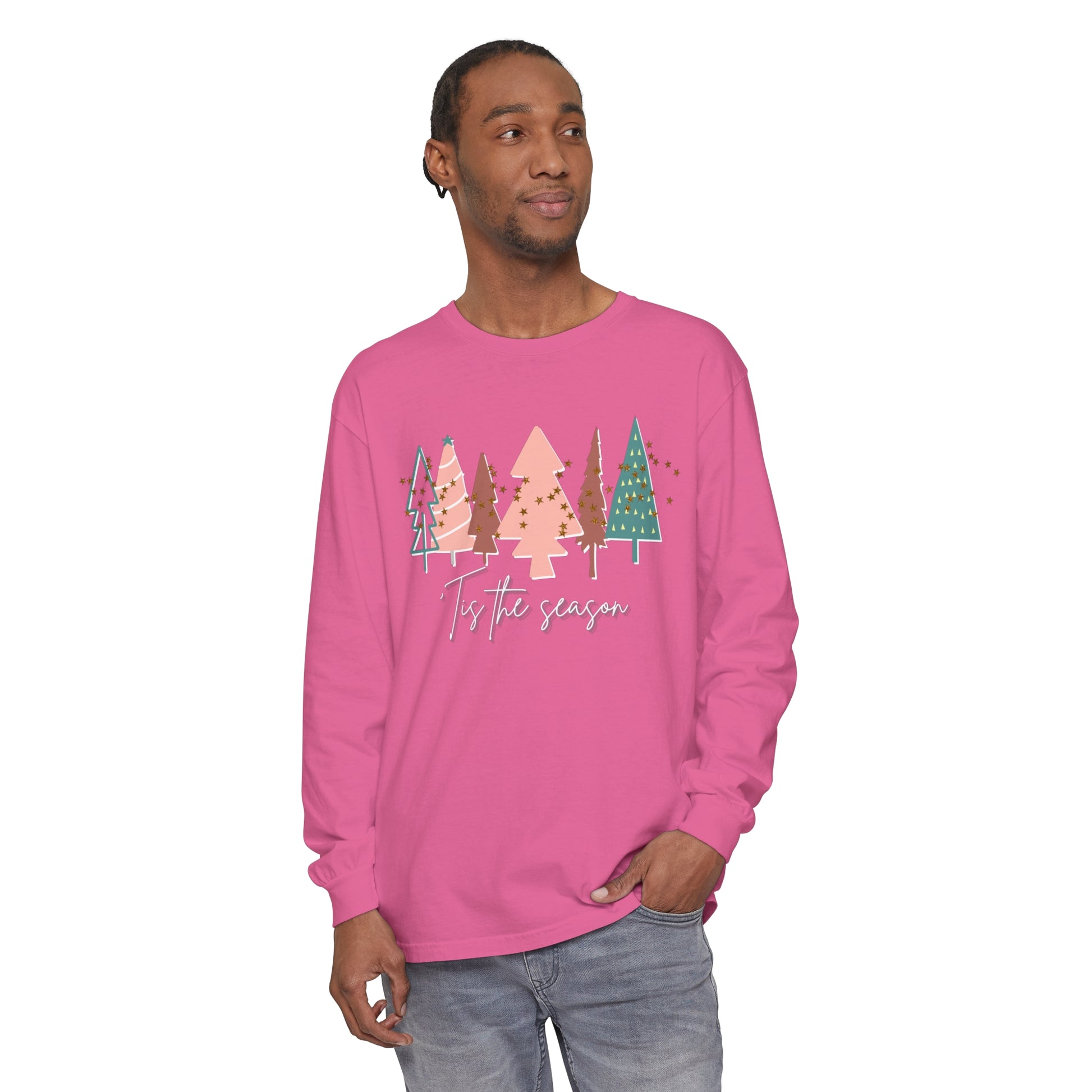 A man wearing a Tis the Season Christmas Tree Shirt by Comfort Colors, blending comfort and style in his winter wardrobe.