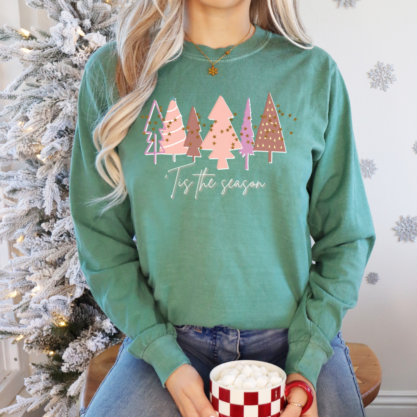 Printify's Women's 'Tis the Season Light Green & Pink Christmas Tree Shirt | Comfort Colors Holiday Tee is a cozy and stylish Christmas trees long sleeve tee.
