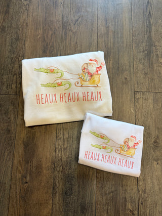 Women’s Heaux Heaux Sweatshirt White Unisex Crewneck Featuring Cajun Santa Pulled By Alligators Crewneck - Chickie Collective