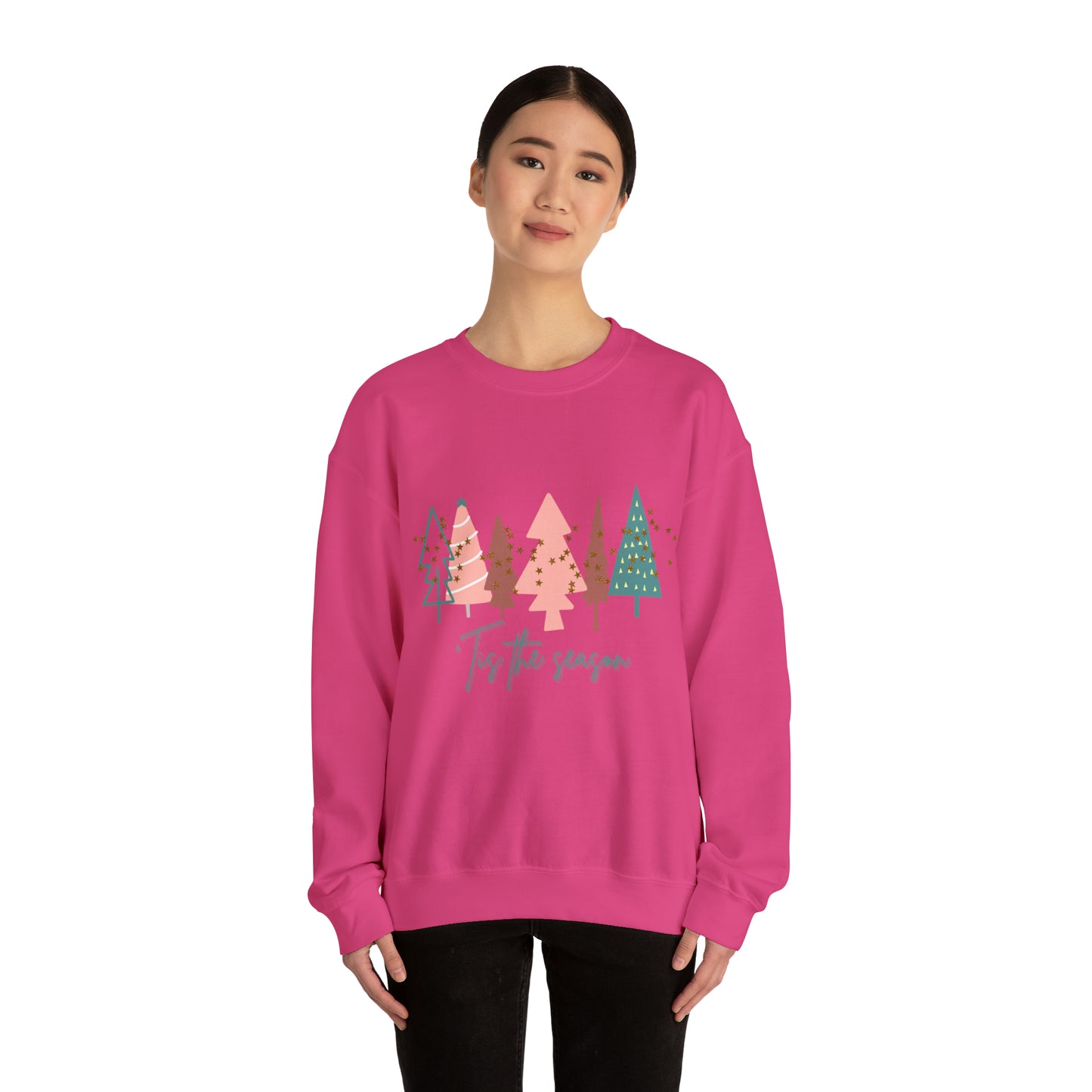 A cozy woman wearing a Printify Christmas Tree Sweatshirt.