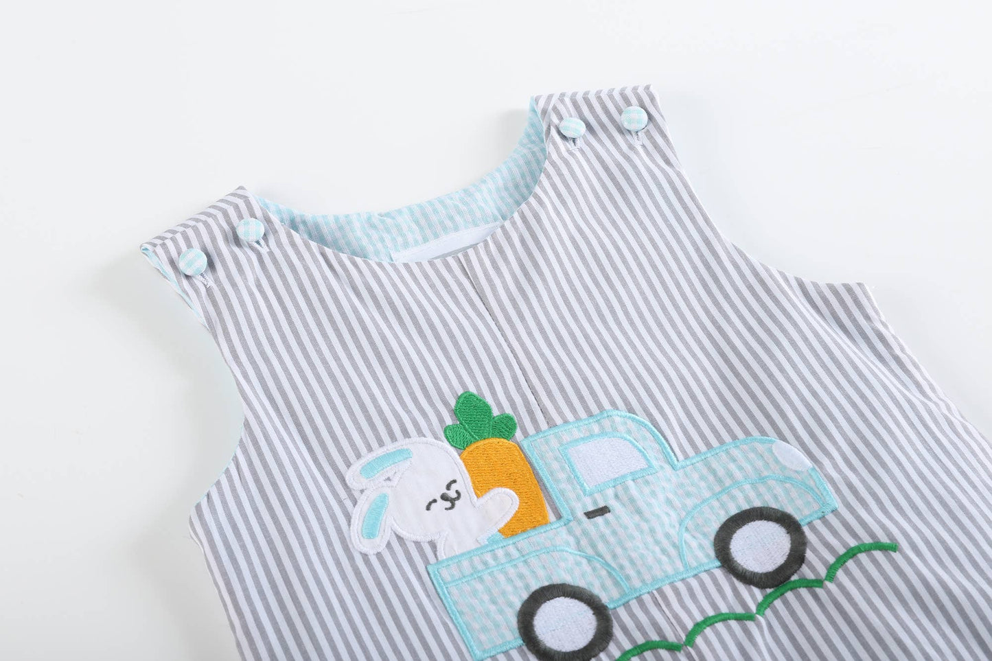 An adorable Lil Cactus Gray Striped Easter Bunny Truck Applique Overalls: 12-18M with cute details.
