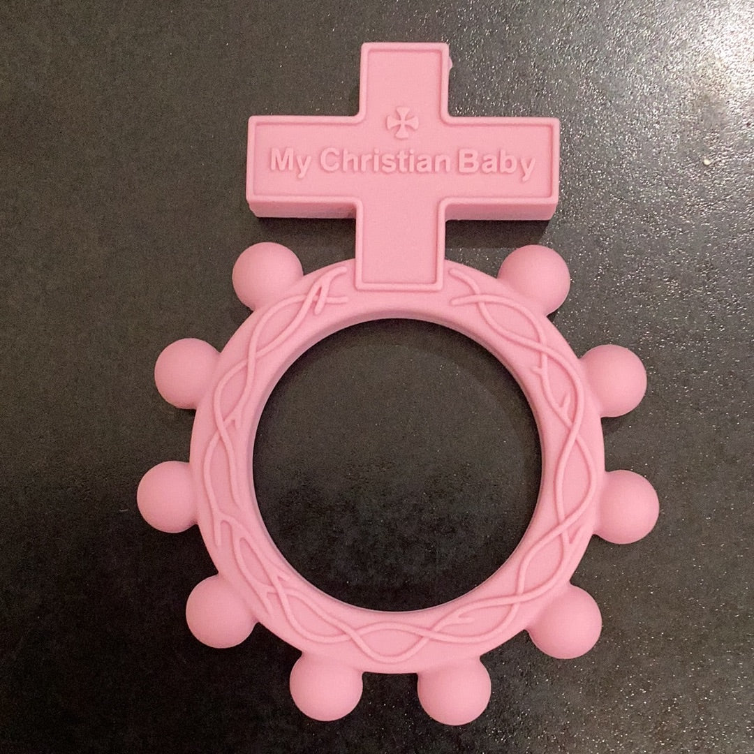 My christian baby loves to play with their Weisinger Designs Rosary Cross Teether.