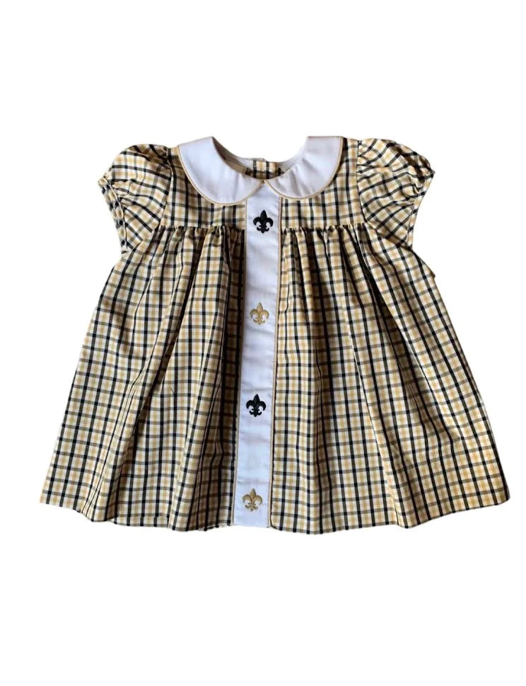 A baby girl's Saints Plaid Dress in yellow and black with Fleur de Lis accents by Lulu Bebe.