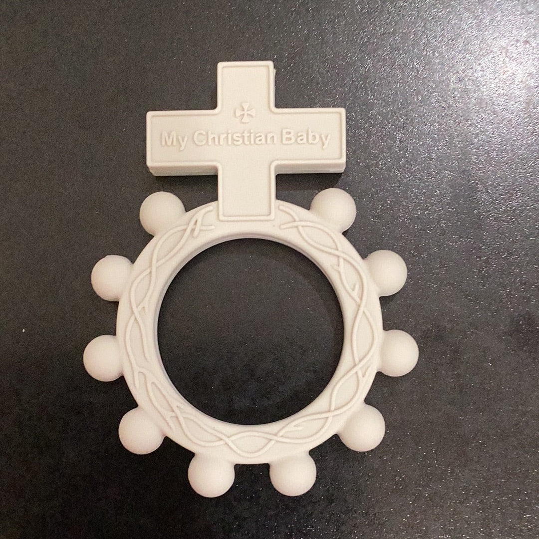 Description: Weisinger Designs Rosary Cross Teether.