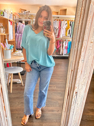 Teal Woven Airflow V-Neck Dolan Top