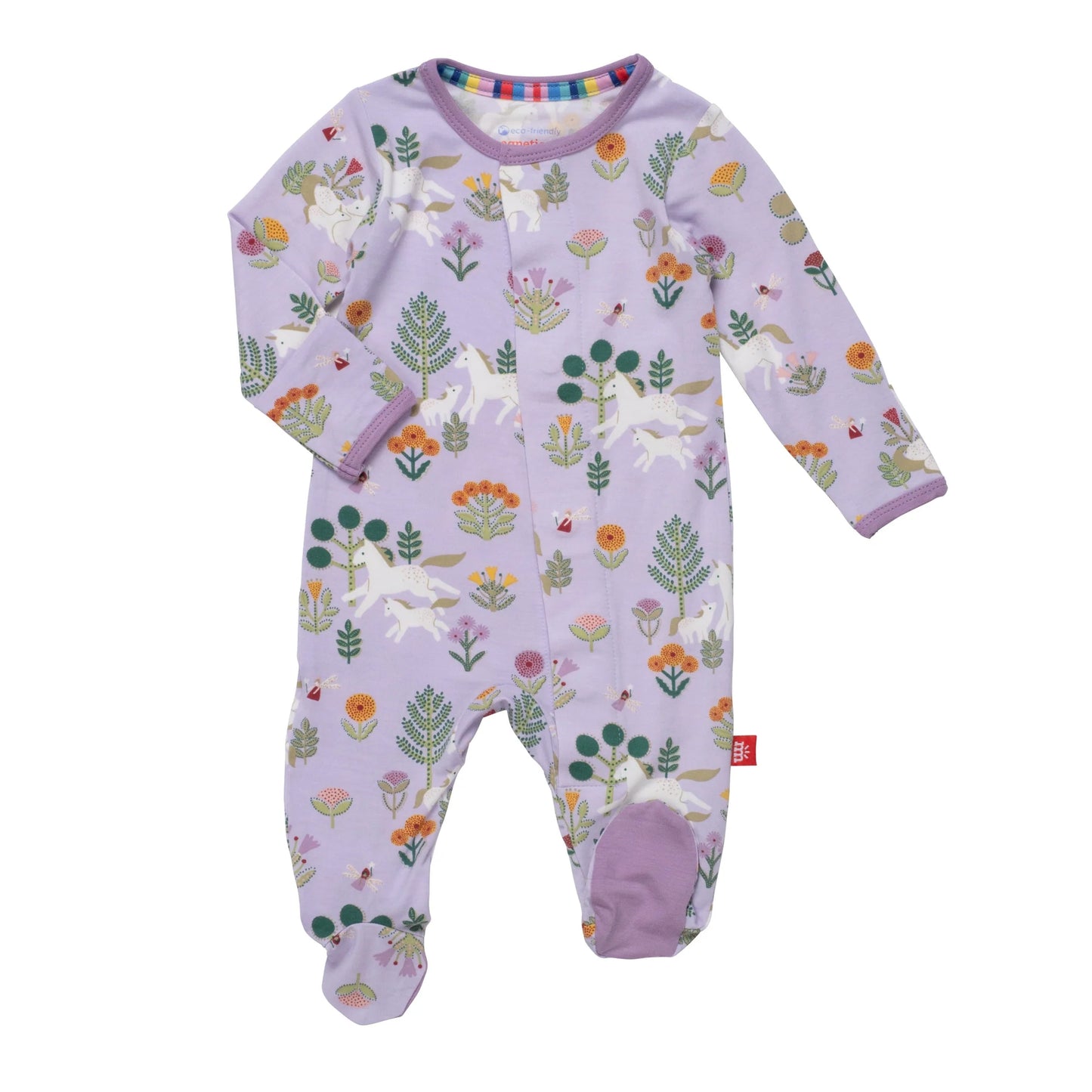 A GOTS certified Organic Cotton Folk Magic Footie by Magnetic Me! with unicorns and flowers on it.