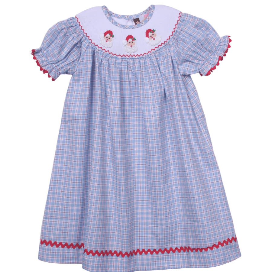 A Banana Split Santa Claus Smock Dress perfect for the holiday parties of the Christmas season, featuring a blue and red gingham pattern with red trim.