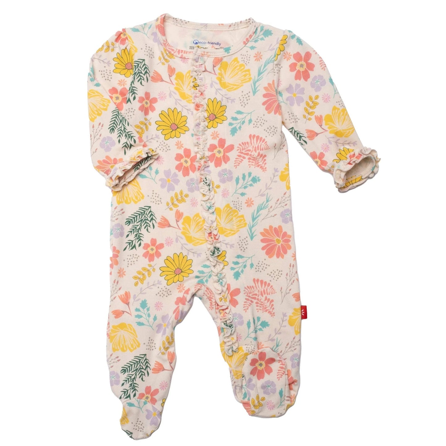A baby's Primrose Cottage Modal Magnetic Ruched Ruffle Footie from Magnetic Me! with flowers on it.