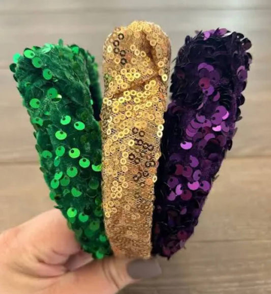 Experience the glamour and charm of Mardi Gras with our stunning Lulu Bebe Sequin Knot Head Bands.