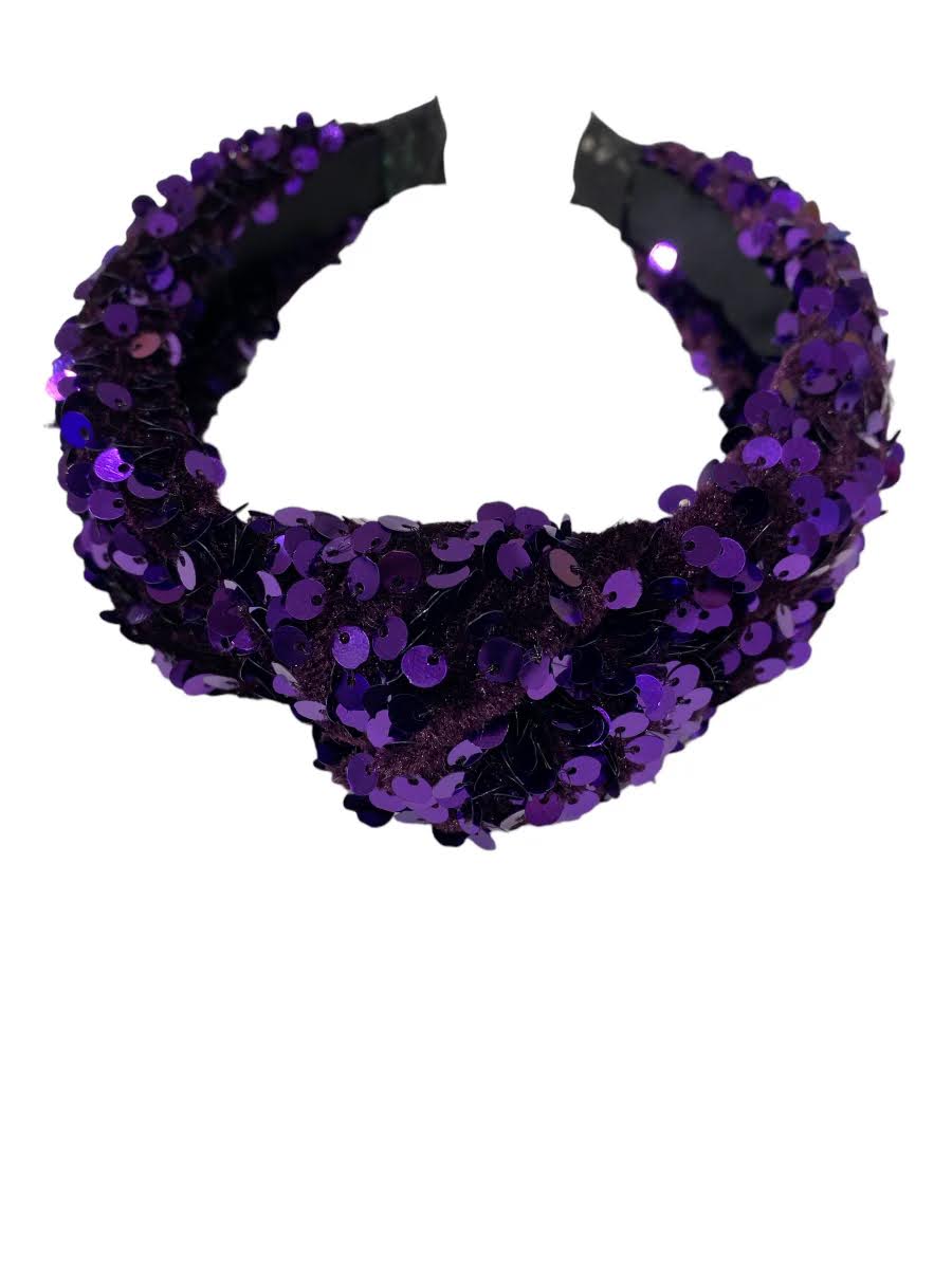 A glamorous purple Sequin Knot Head Band adorned with charming black sequins from Lulu Bebe.