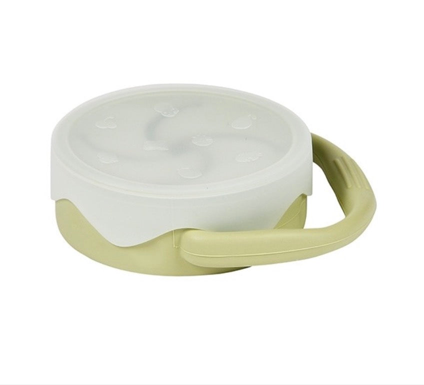 A Maison Chic Silicone Snack Cup with a lid.