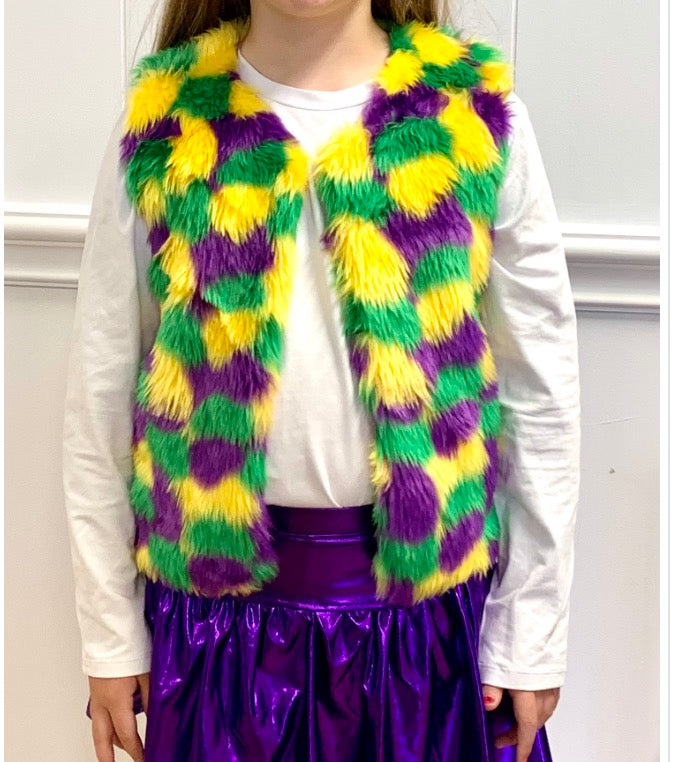 A little girl wearing an Azarhia Mardi Gras Faux Fur Vest.