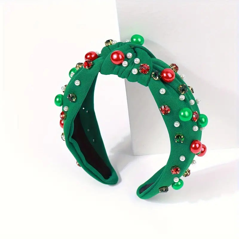 A Christmas Knotted Headband With Rhinestone Faux Pearls from Chickie Collective with red and green beads.