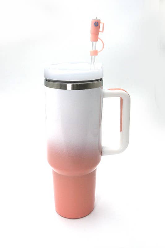A pink and white 40oz CLOUD/FLOWER/RAINBOW TUMBLER with a straw cup from Wall To Wall Accessories.