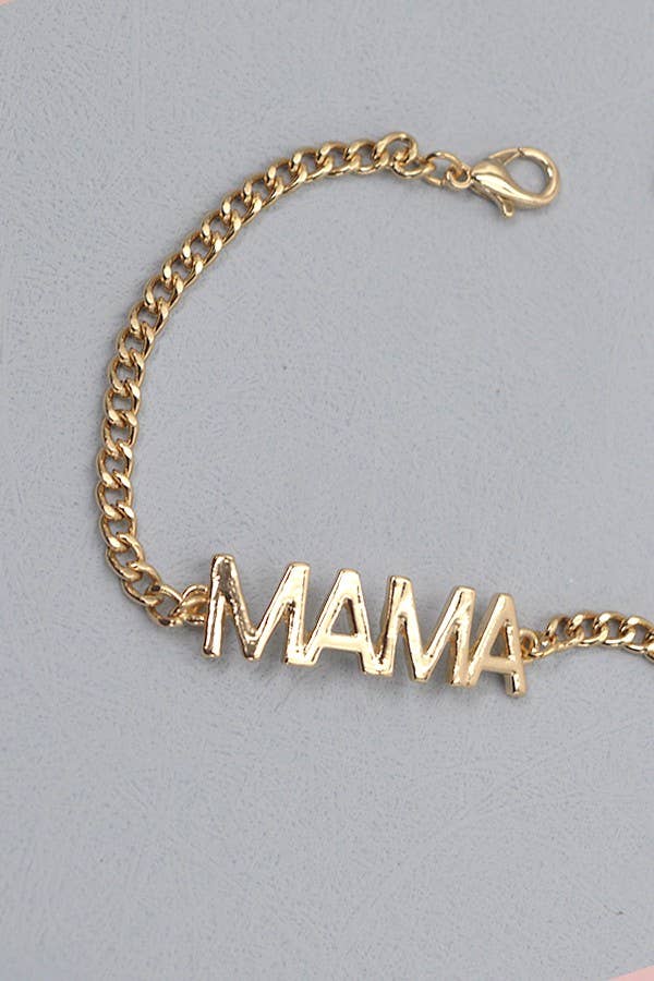 An elegant accessory, the Wall To Wall Accessories Mama Bracelet is a stunning gold bracelet gracefully displaying the word "mama", celebrating the beautiful journey of motherhood.