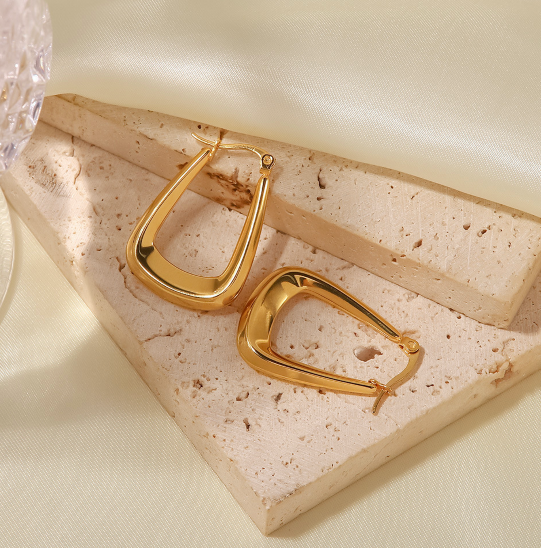 A pair of WS-Trapezoid hoop earrings with a stone accent, by 3Souls Company.