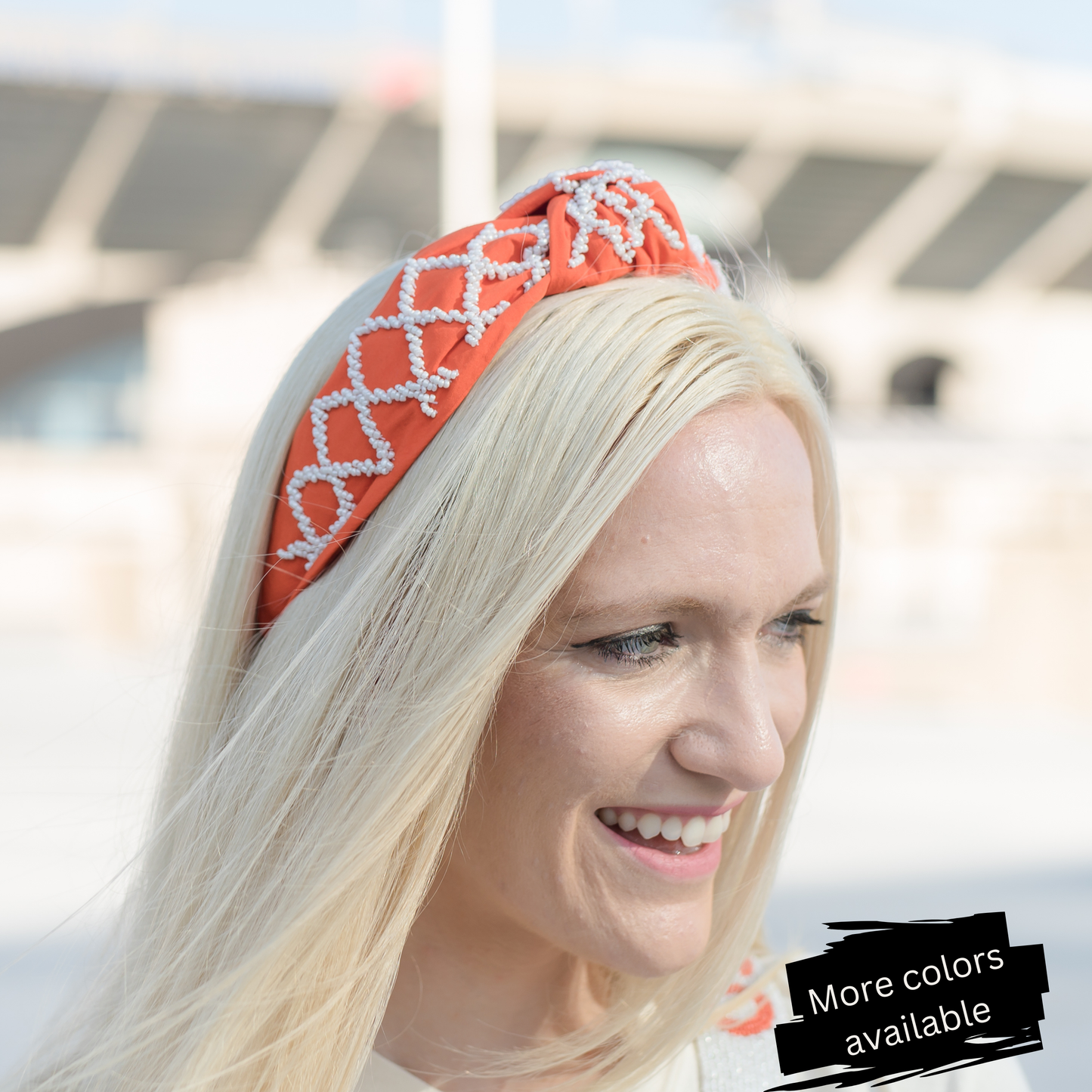 A bash blonde woman wearing a Bash Game Day Beaded Football Headband in Purple with Multiple Color Options, Width: 6.5", Height: 2.5", perfect for game day festivities and football.