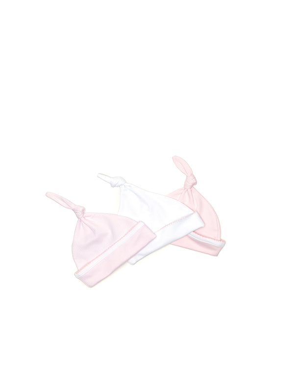 A pair of Milly Marie Pima Knot Hats in White & Pink on a white background.