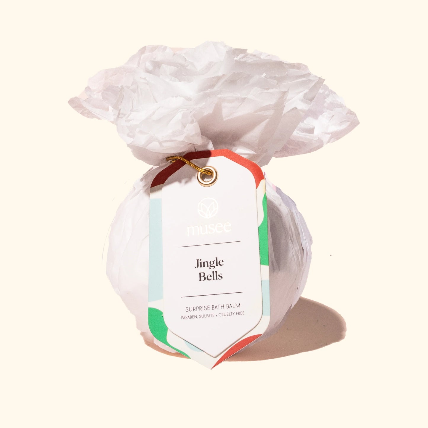 A bag of Musee Jingle Bells Surprise Bath Balms with a holiday scent.