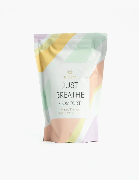 A bag of Musee's Just Breathe Bath Soak on a white background.