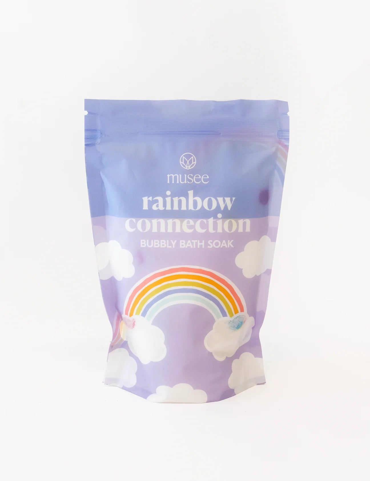 Immerse yourself in a magical bathing experience with Musee's Rainbow Connection Bubbly Bath Soak. This enchanting bag creates a whimsical oasis, filling your tub with vibrant colors and blissful bubbles.