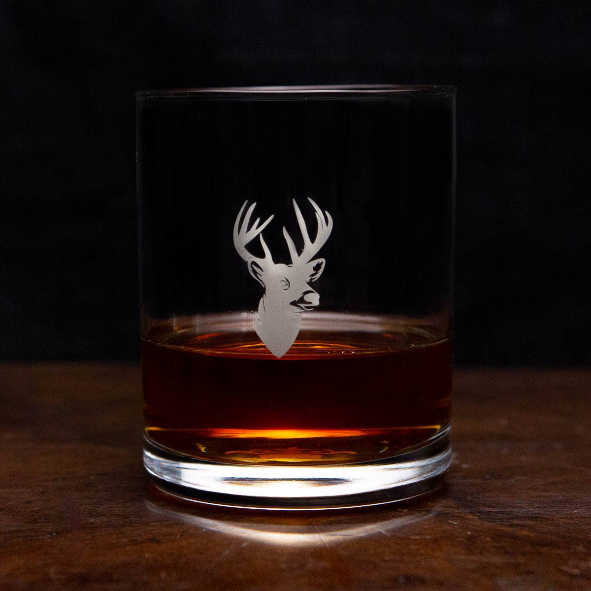 A Deer Rocks Glass Gift Set with a deer head cut out of it from The Royal Standard.