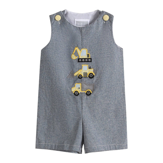 A baby boy's romper with construction vehicles on it could be the Gray Construction Shortalls by Lil Cactus.