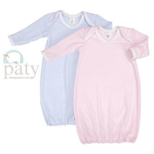 A pair of Paty cotton baby gowns with long sleeves.