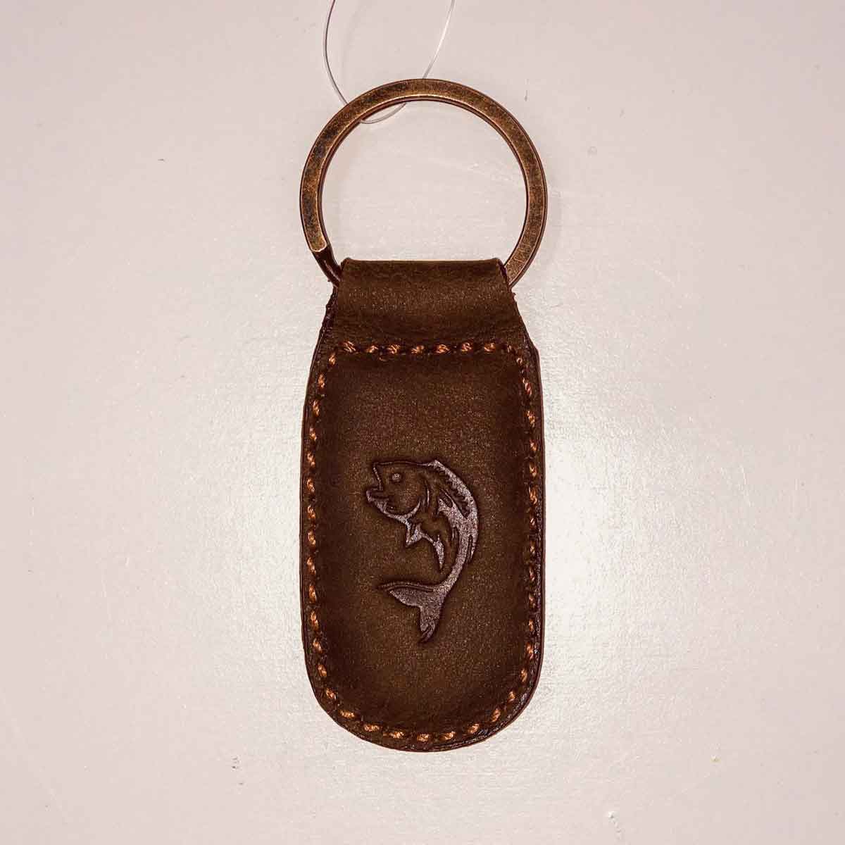 A Fish Leather Embossed Keychain from The Royal Standard.