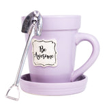 A Lilac Flower Pot Mug - Be Awesome with a spoon in it, by Nicole Brayden.