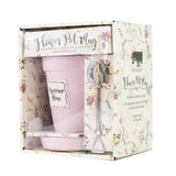 A Nicole Brayden Pink Flower Pot Mug - Awesome Mom sitting inside of a box.