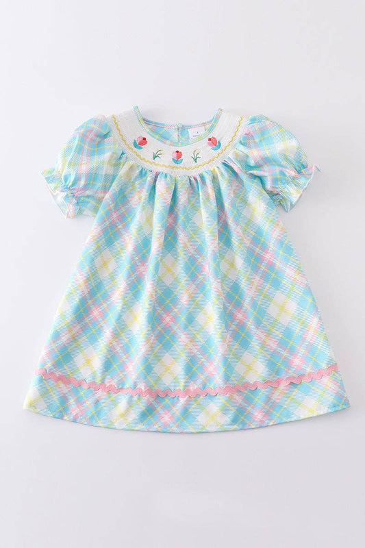 A baby girl's Honeydew blue plaid floral smocked dress.