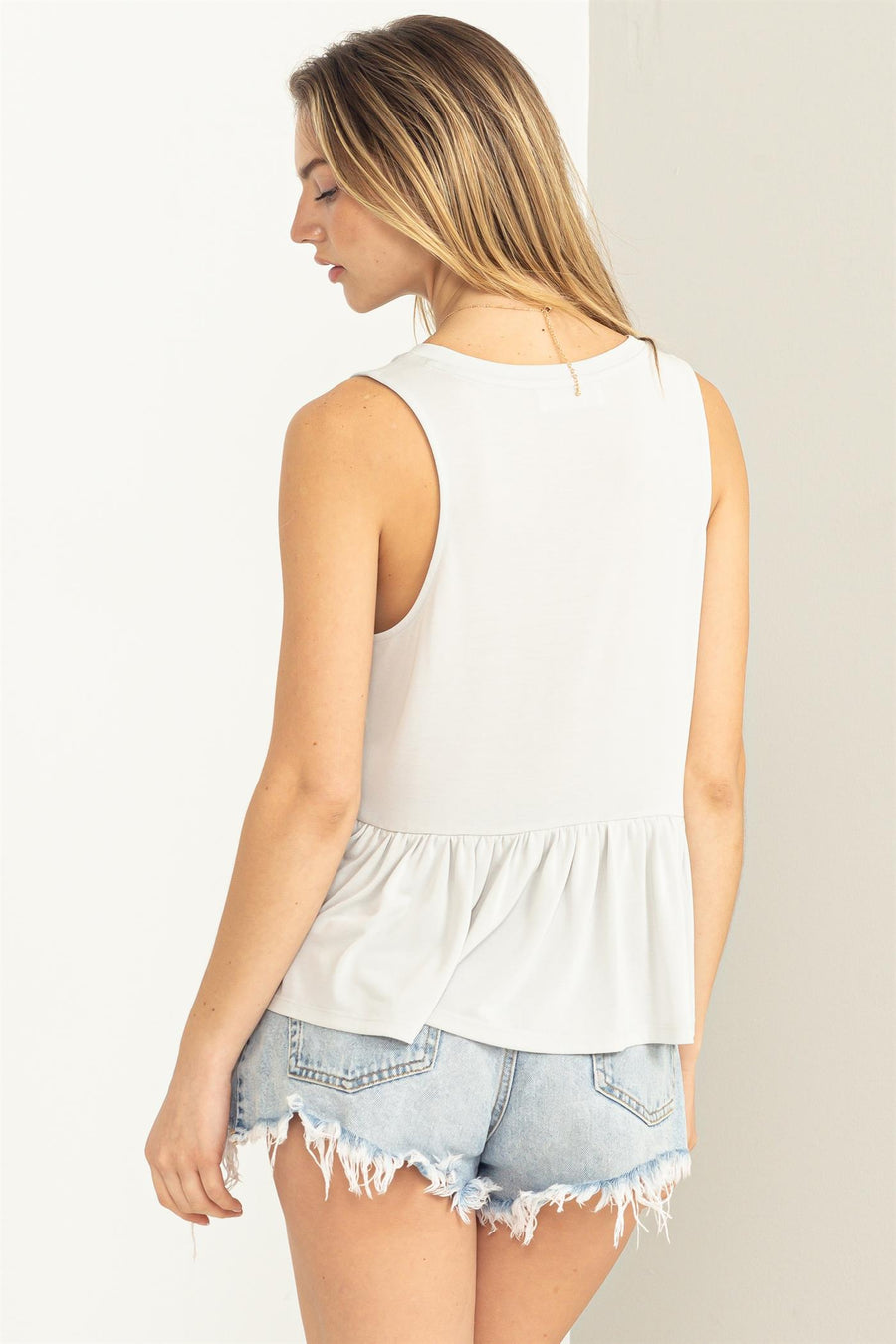 V-Neck Sleeveless Peplum Top